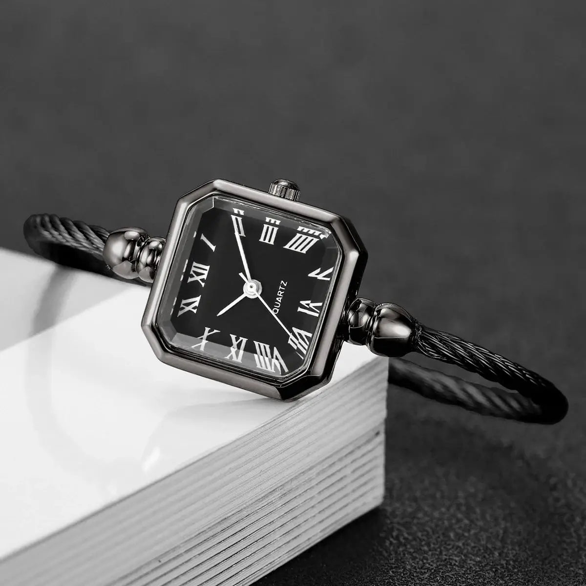 Women's square black Roma-dial quartz watch with twisted metal bracelet by Simples Market