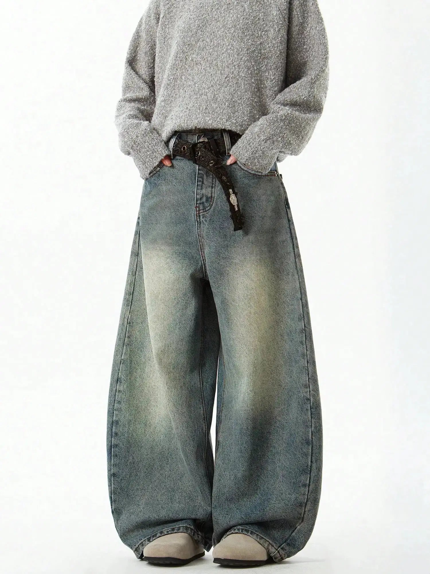 Men's blue wide-leg denim jeans with a baggy loose fit