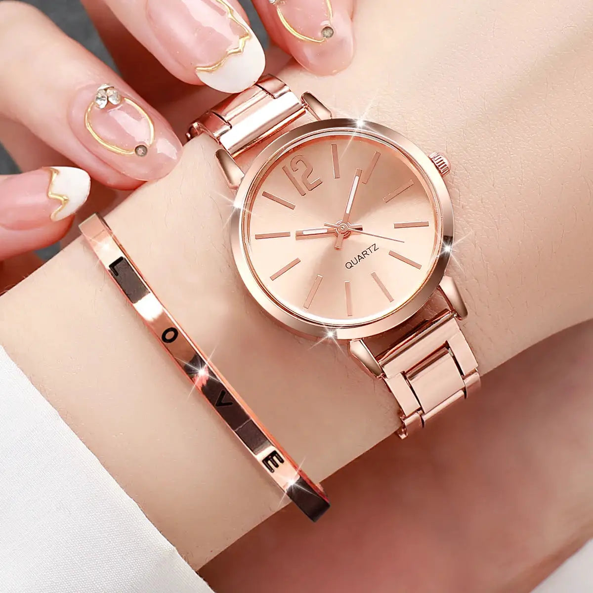 2pc women's rose-gold watch and opening cuff bracelet set; rose-gold steel band quartz wristwatch with a Love cuff.