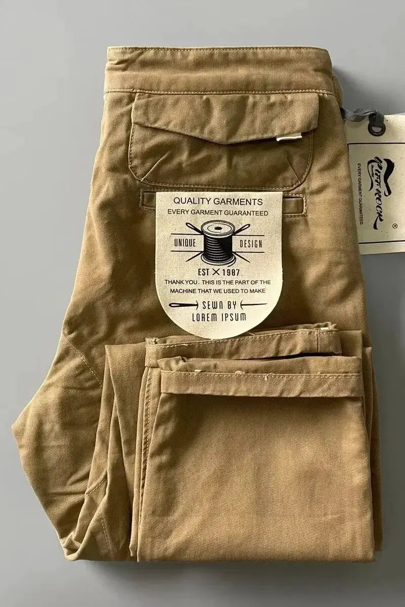 Cargo pants by Simples Market, tan cotton fabric with multiple pockets and loose straight leg