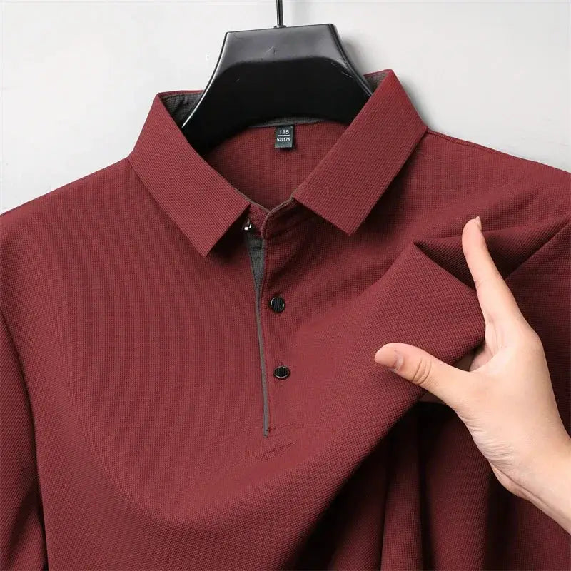 Simples Market men's burgundy long-sleeve polo shirt on hanger; solid color with button placket.