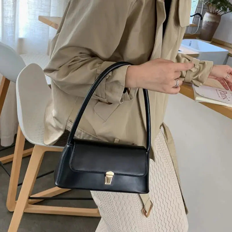 Shoulder bag black Simples Market retro handbag with gold-tone clasp, compact solid-color design