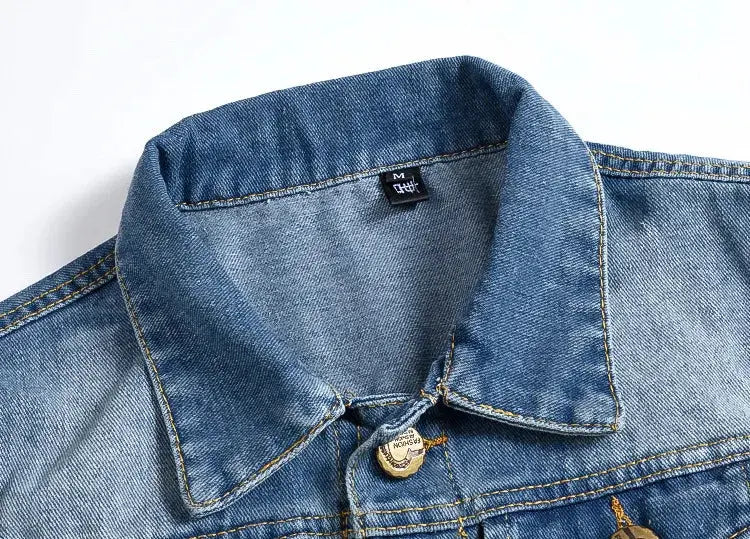 Men's blue denim sleeveless vest with metal buttons, close-up collar detail.