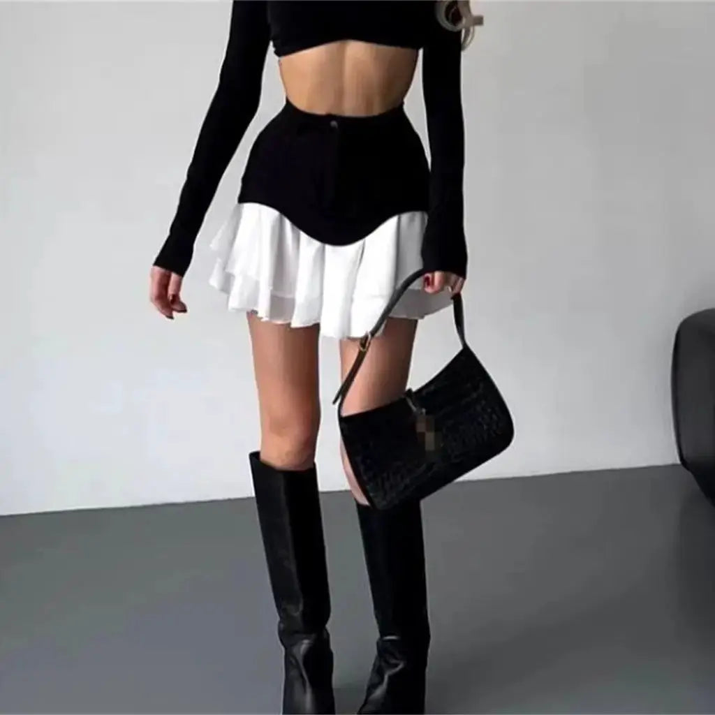 Chic Ruffles women's mini skirt; black high-waisted with white layered hem.