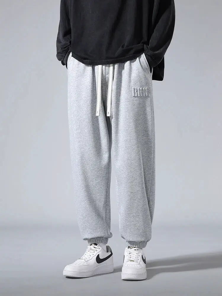 Men's grey cotton/polyester jogger pants with drawstring, Simples Market, baggy hip-hop style.