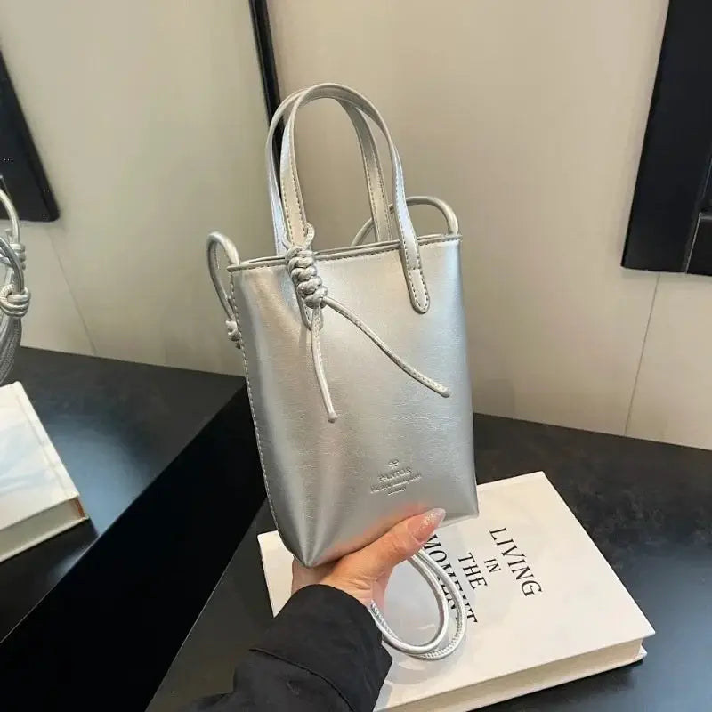 PU Leather Mini Crossbody Bag for Women by Simples Market, silver metallic, compact luxury shoulder bag.