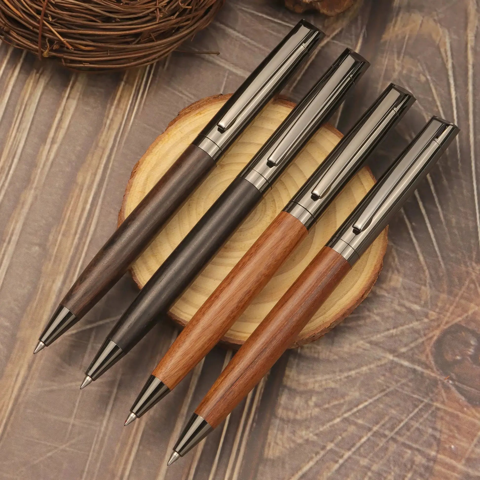 Simples Market 5-piece set of metal ballpoint pens with wood barrels and black ink.