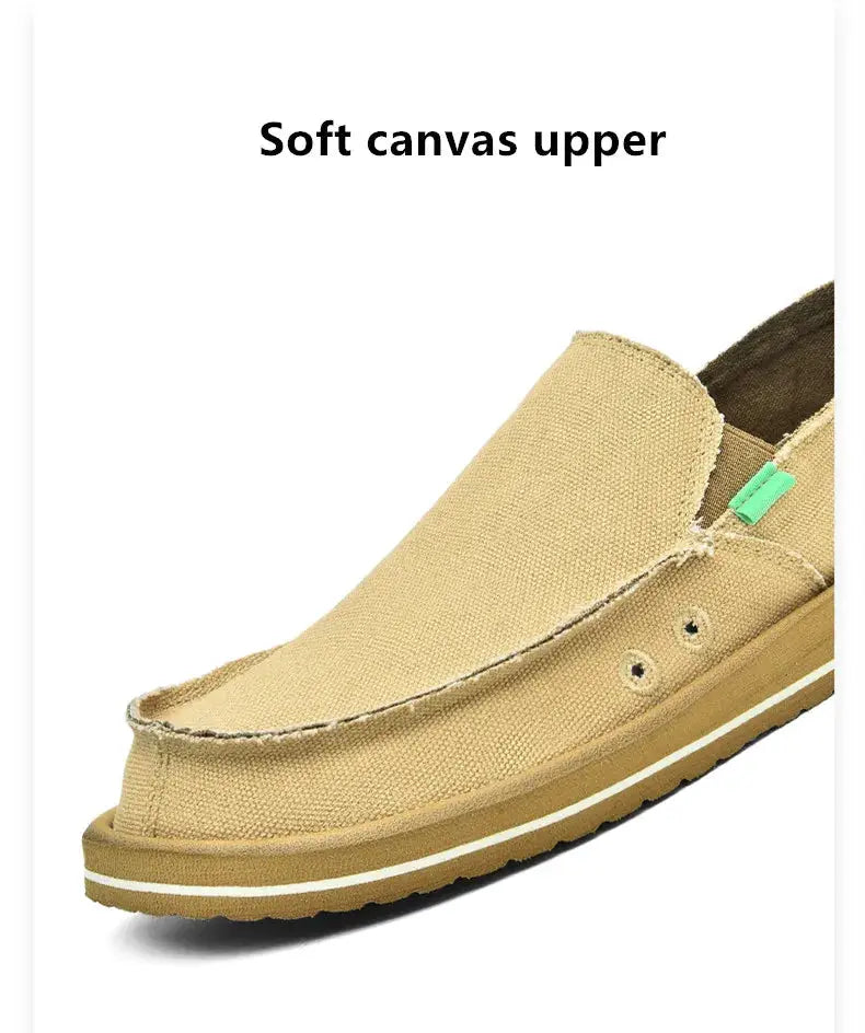 Men's breathable canvas loafers with soft canvas upper, tan color, low-top design, green pull tab and gum sole