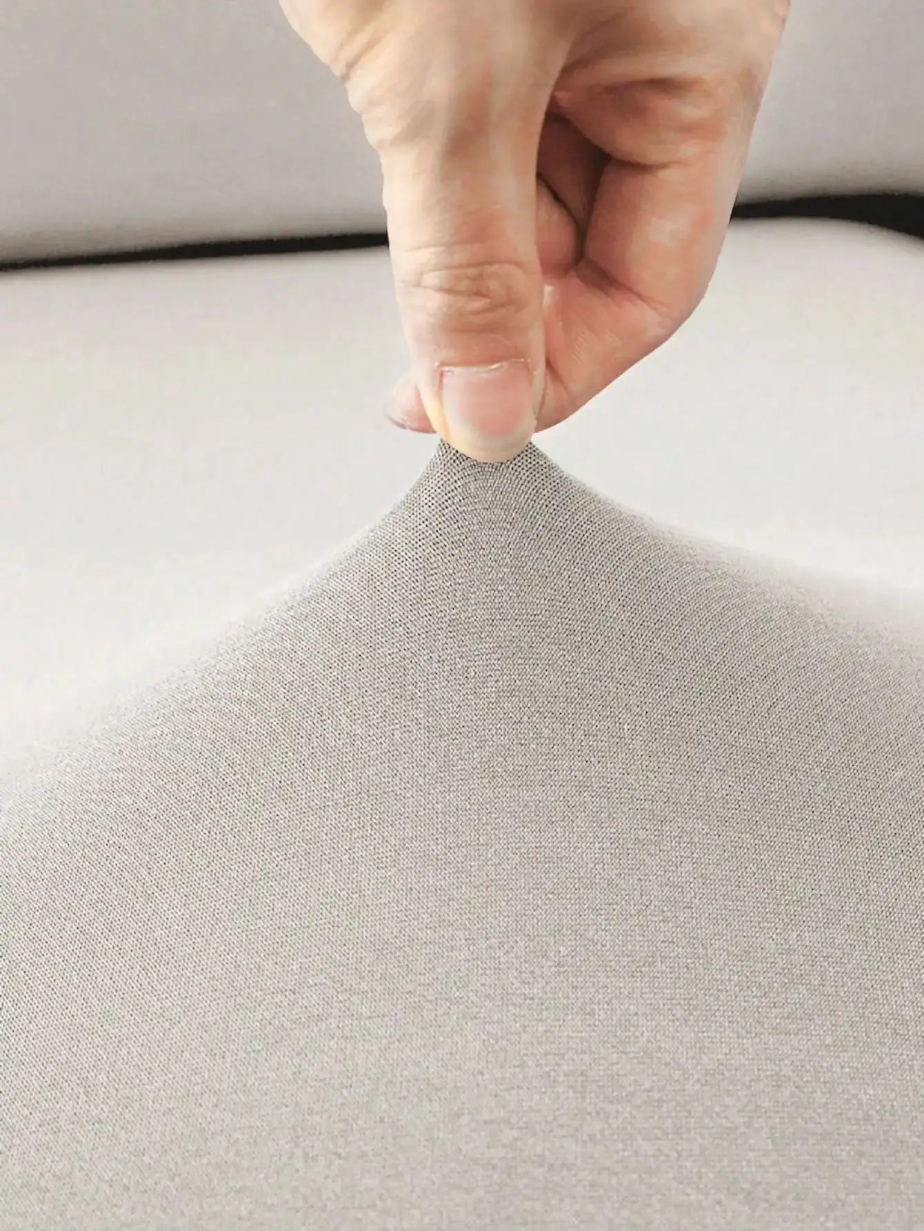 1pc Solid Milk Silk Elastic Sofa Cover in light beige; close-up fabric texture.
