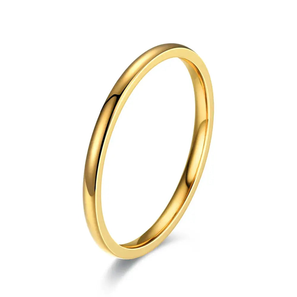 Gold-tone unisex ring with polished finish, classic fashion accessory