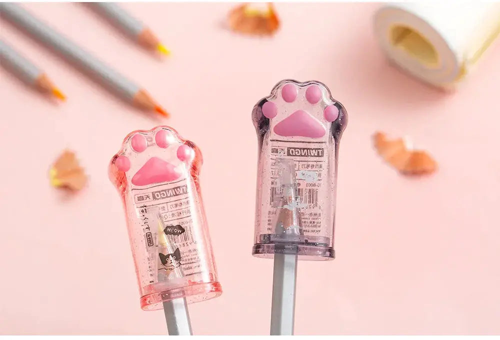Kawaii cat paw shaped pencil sharpeners by Simples Market, pink translucent plastic, set of 2
