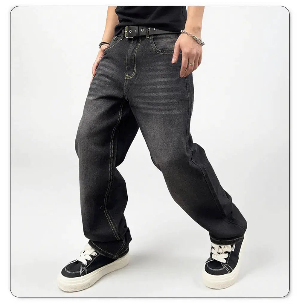 Men's black baggy straight-leg denim jeans with retro washed finish and contrast stitching.
