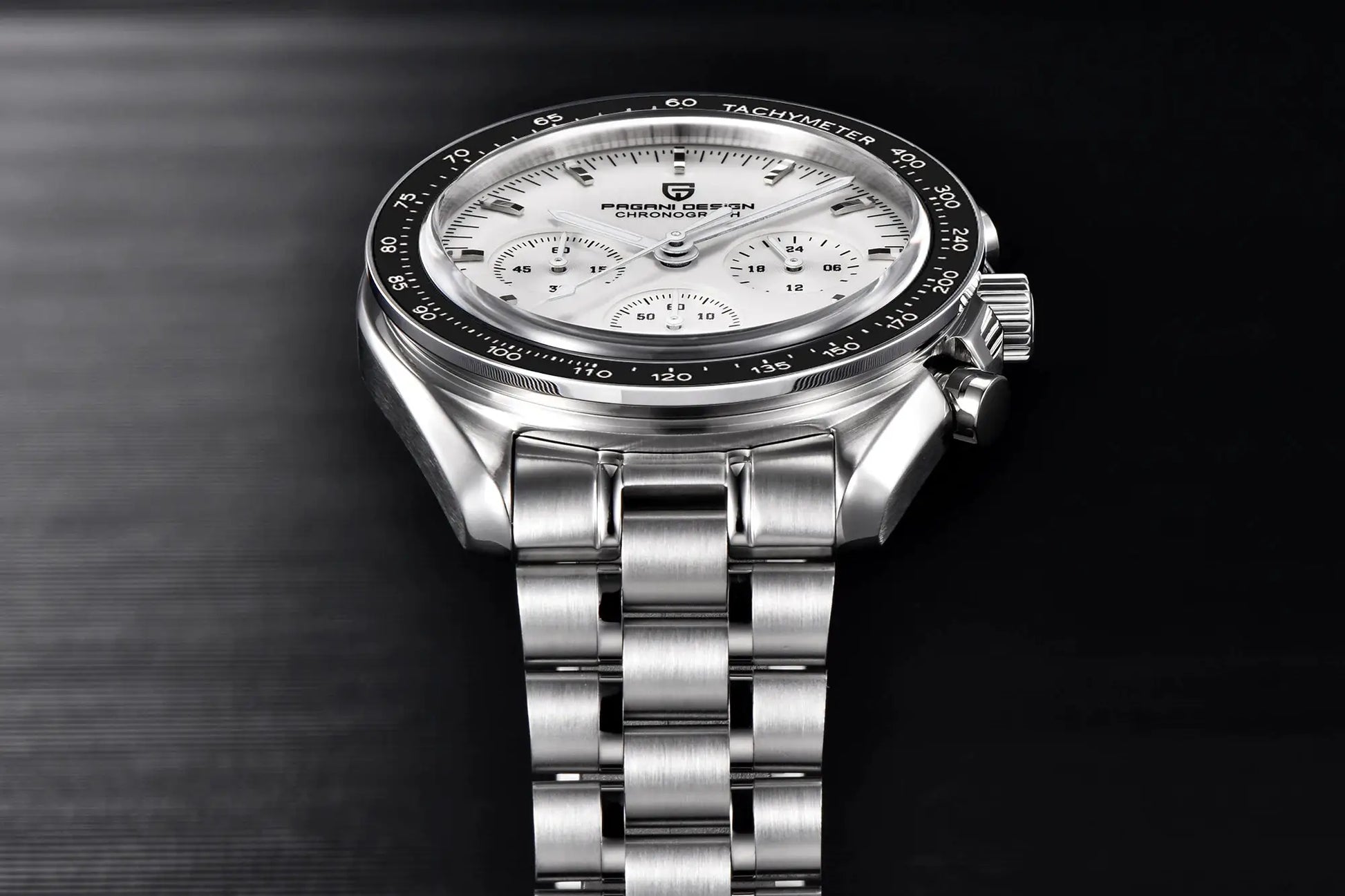 Pagani Design chronograph watch with stainless steel bracelet, white dial, and black tachymeter bezel.