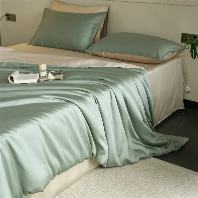Mulberry silk bedding set by Simples Market in sage green with duvet cover, sheets and pillowcases