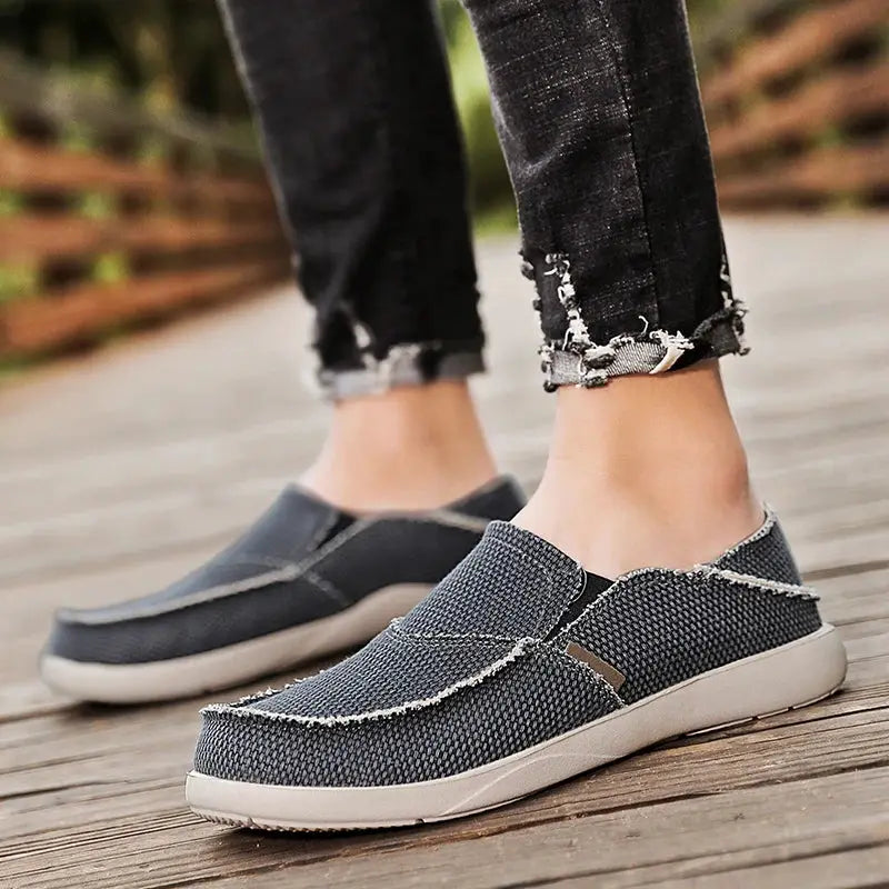 Men's lightweight gray denim canvas slip-on shoes with white sole