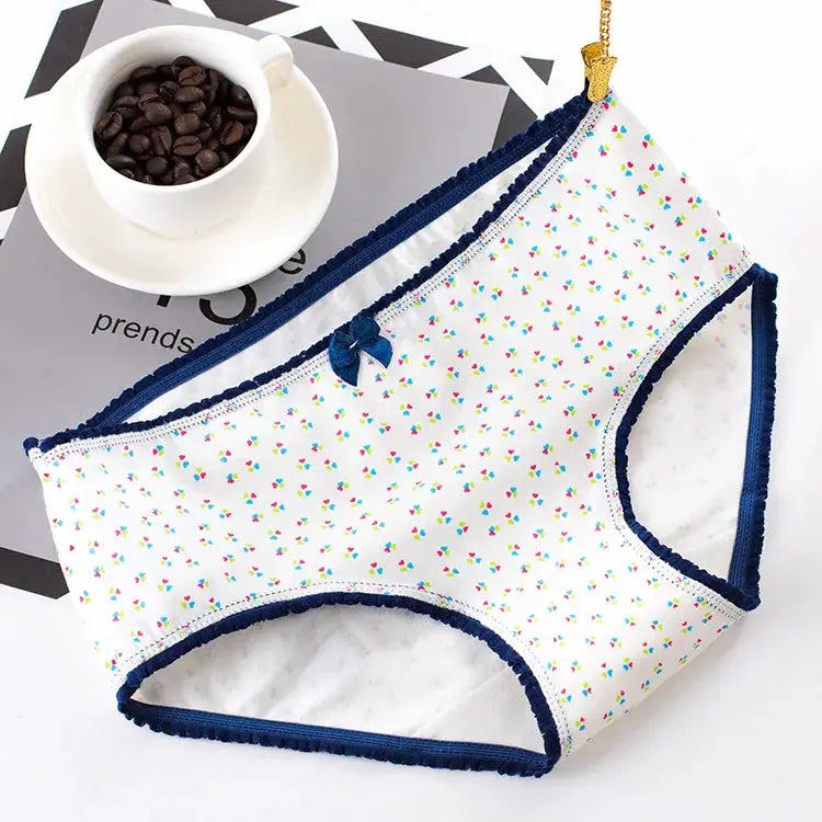 Women's cotton underwear, white with tiny colorful dot print, navy trim and front bow, briefs style