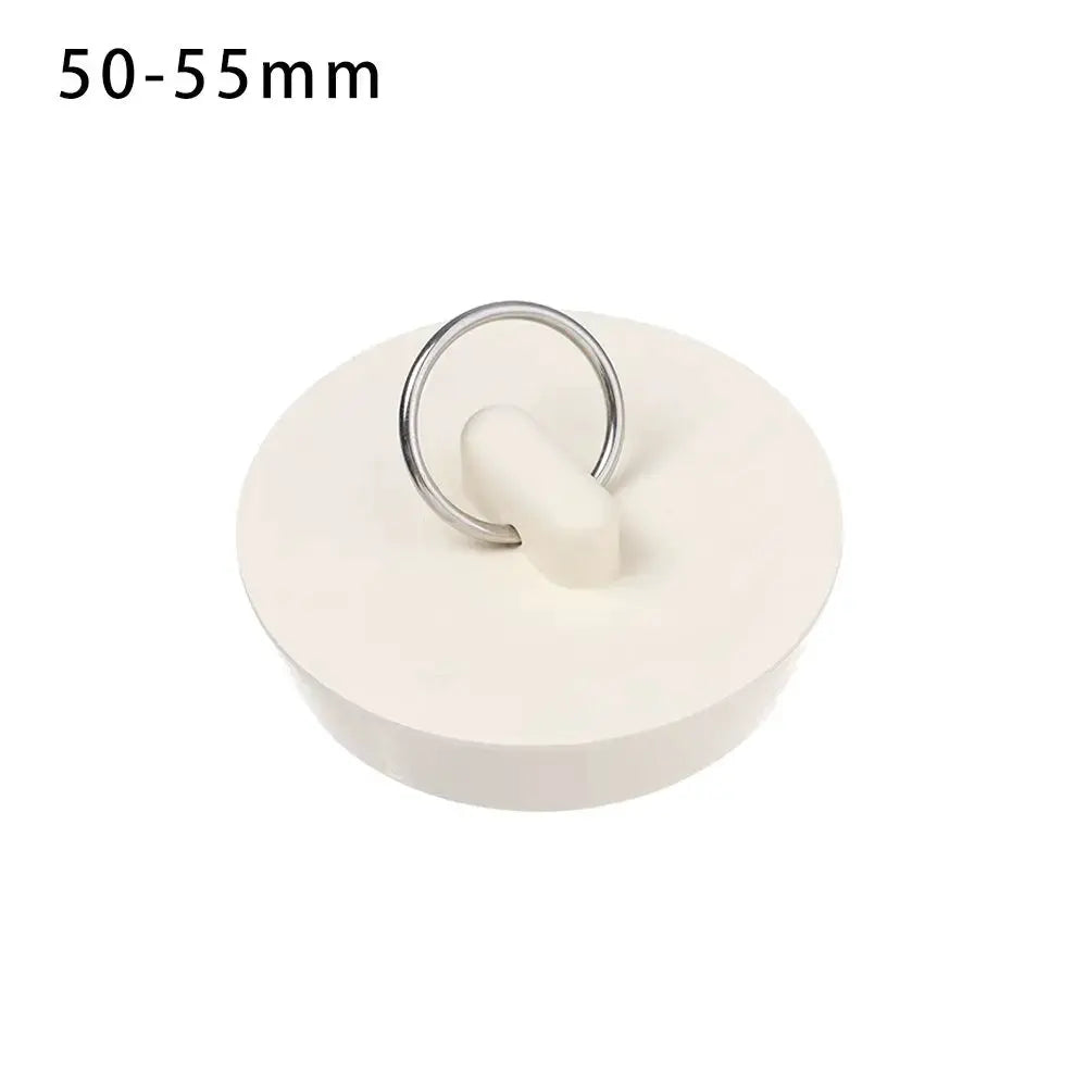 White rubber sink plug with metal ring, 50–55mm diameter.