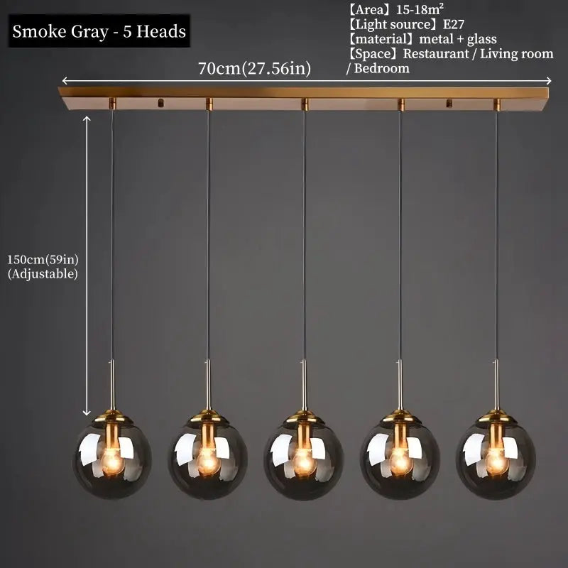Chandelier by Simples Market: five smoke-gray glass pendant lights, metal fixture