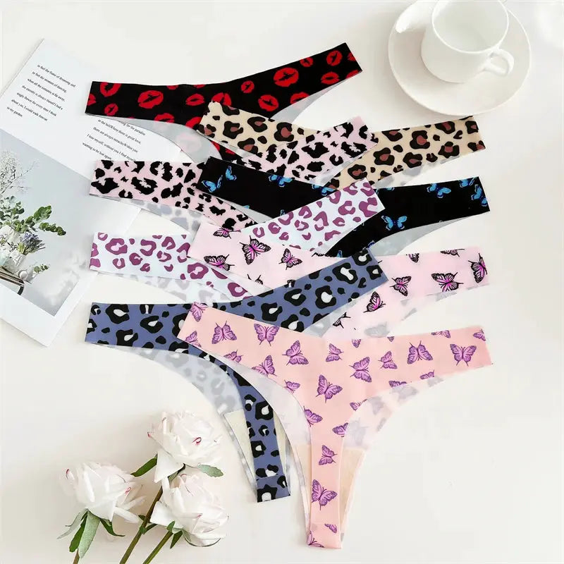 FINETOO 4-pc women's thong underwear set; graphic leopard and butterfly prints, seamless, ultra-soft