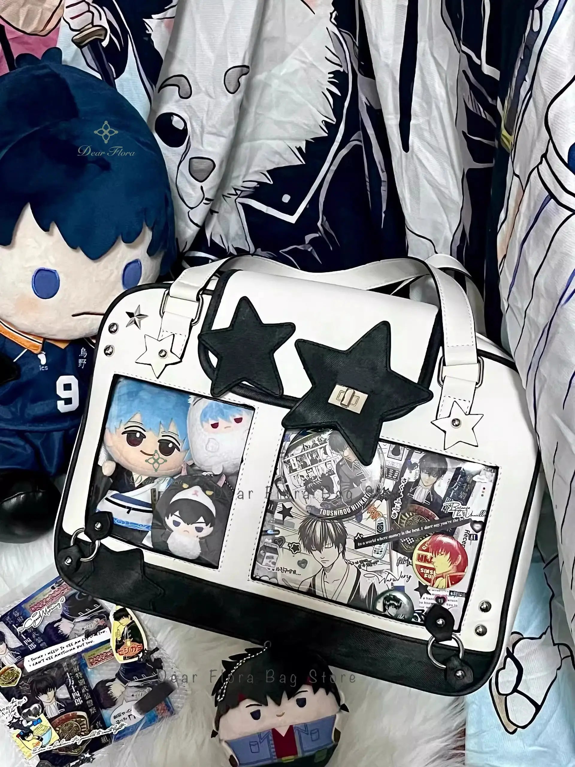 Simples Market Y2K star ita bag, white with black star patches, transparent panel showing manga art, crossbody purse