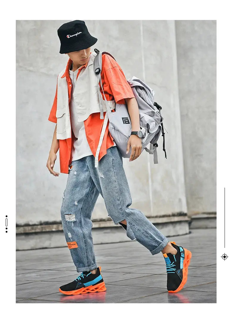 Simples Market men's mesh sneakers; black with blue laces and orange thick sole
