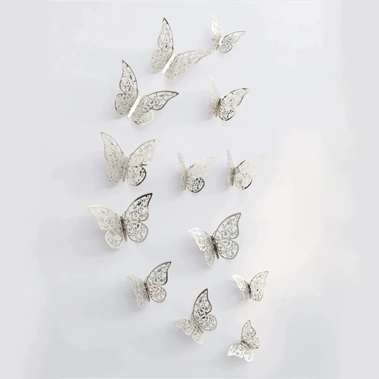 12-piece set of silver hollow 3D paper butterfly decorations for wall display