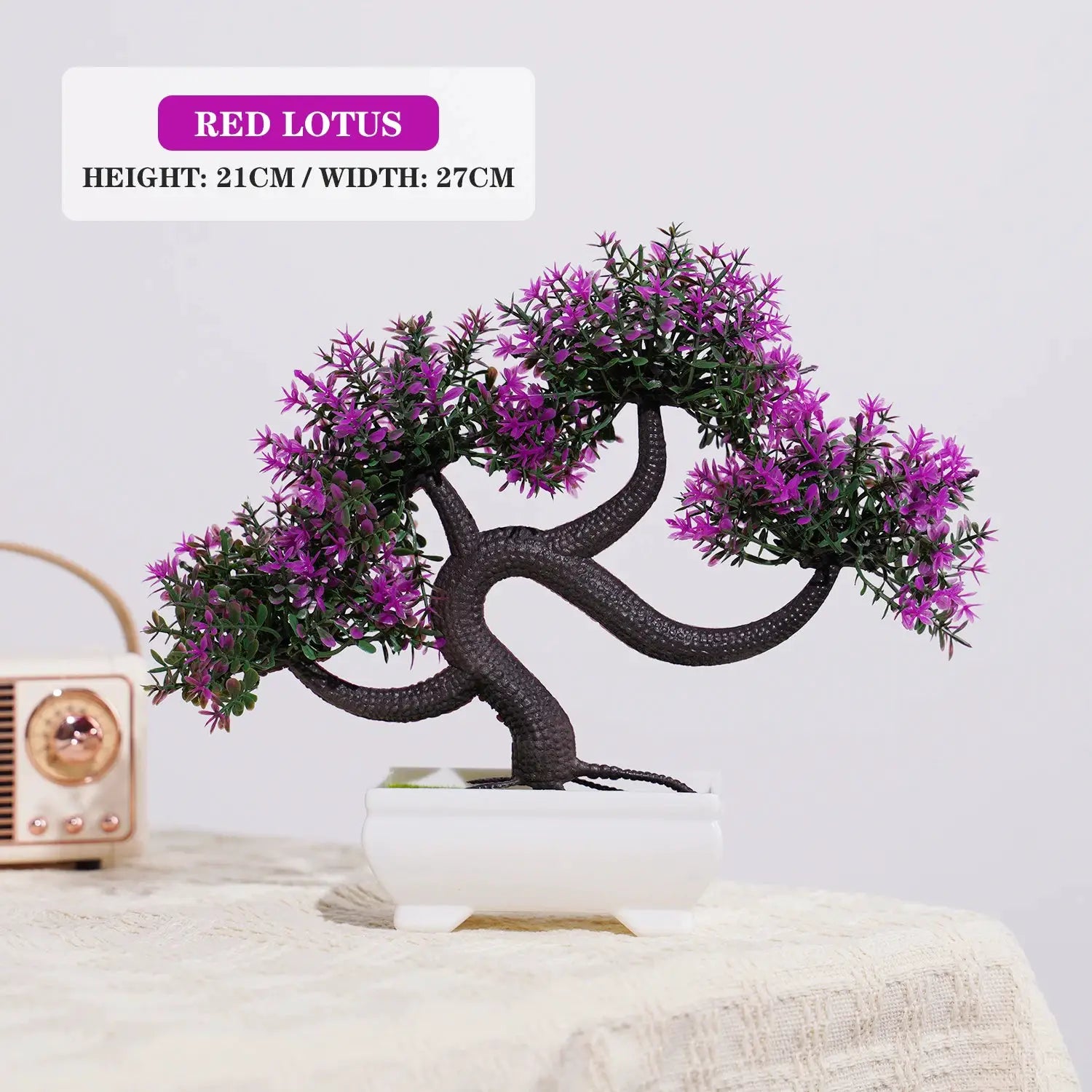 Artificial bonsai tree with purple-pink blossoms in a white ceramic pot for tabletop decor by Simples Market
