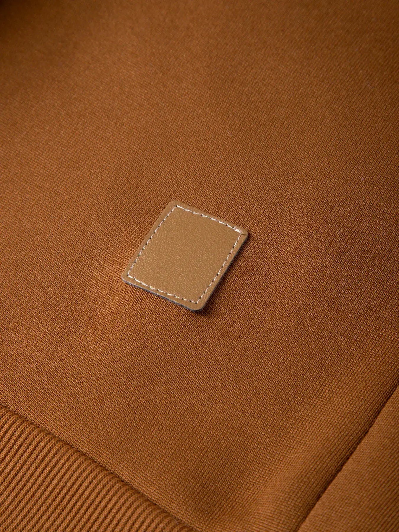 Autumn men's brown knit pullover sweater with tan square patch