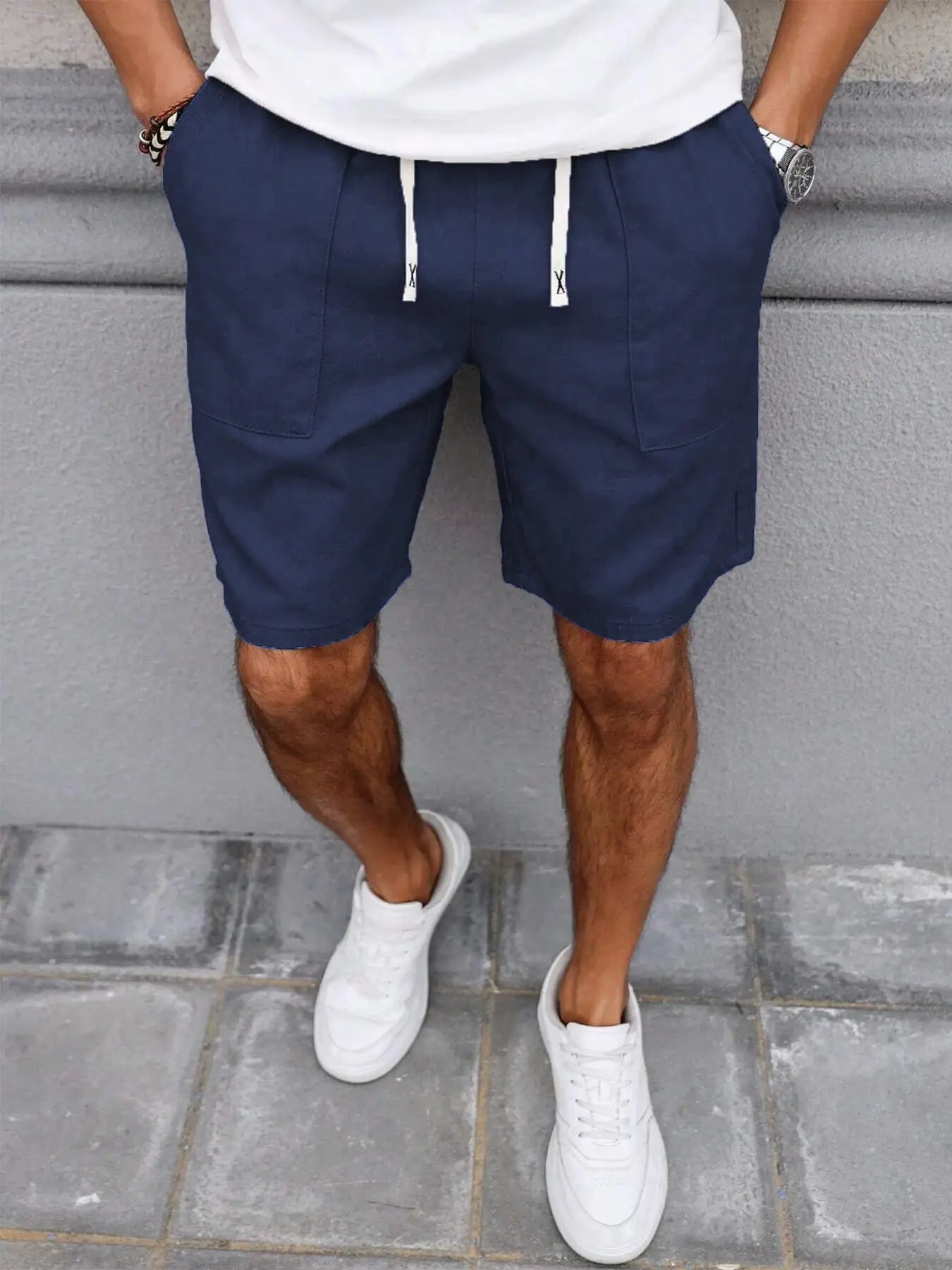 Men's navy blue mid-length shorts with white drawstring, casual solid-color design