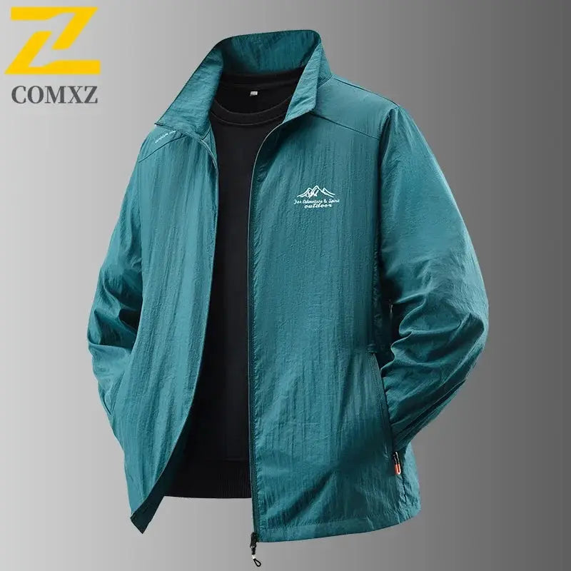Men's sun protection jacket in teal, ultralight breathable shell with COMXZ logo