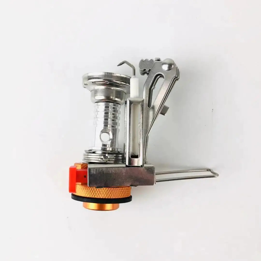 Portable aluminum camping gas stove by Simples Market with orange control knob and foldable legs