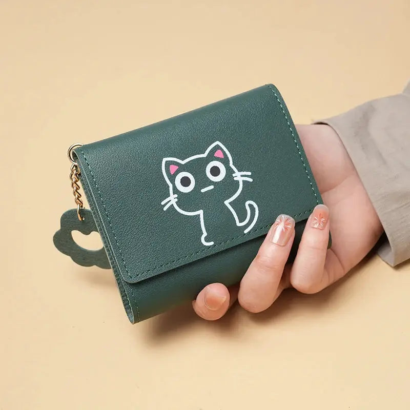 Green short-style purse with white cat illustration, compact multi-card wallet