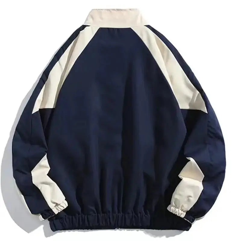 Hip hop varsity windbreaker jacket with navy and cream color-block patchwork, elastic cuffs and hem
