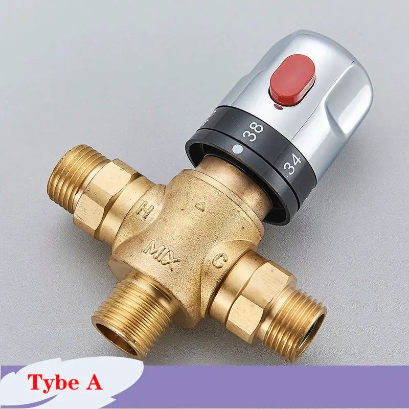 Brass thermostatic mixing valve by Simples Market; chrome control knob with red push button