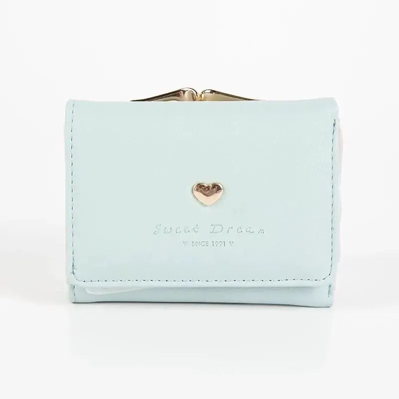 Mini pastel blue folding wallet by Simples Market with gold heart charm and Sweet Dream text