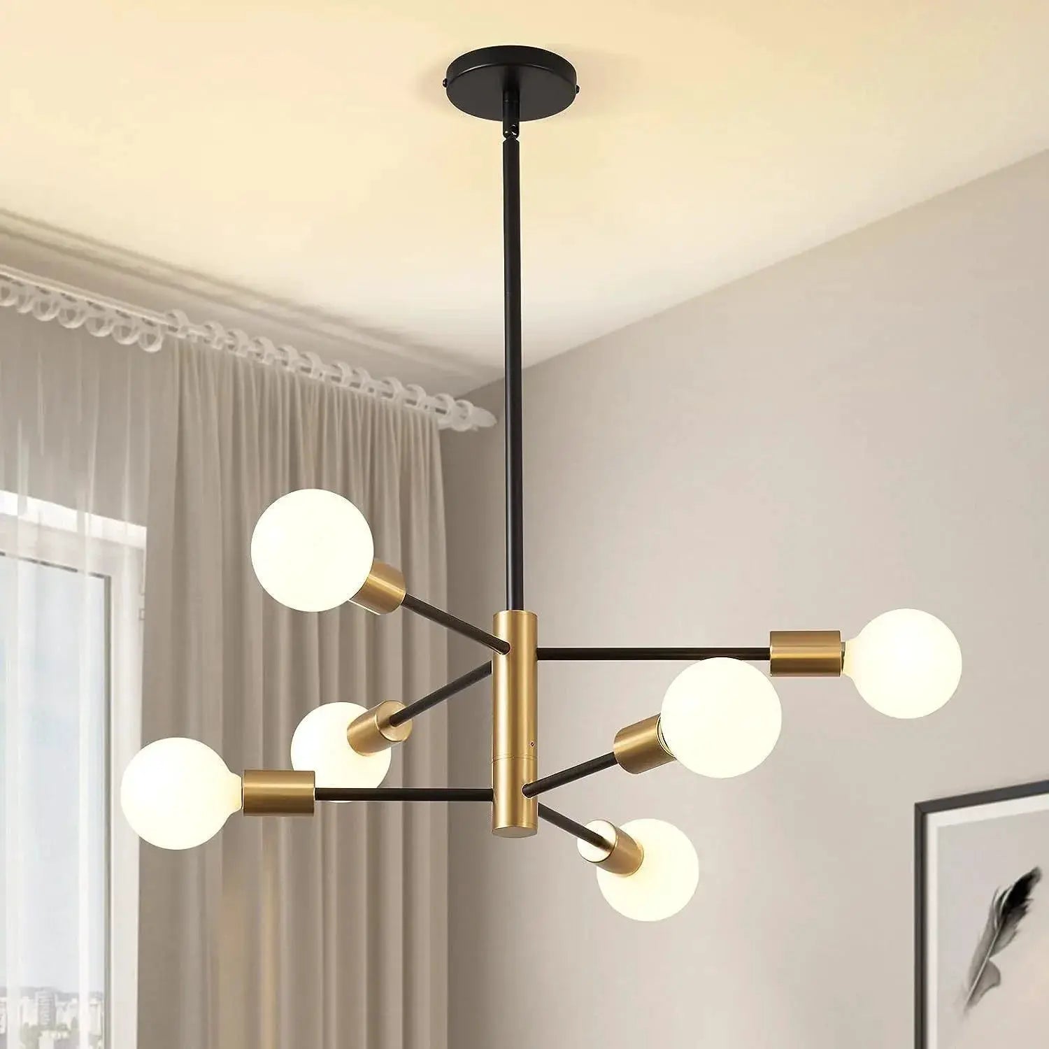 Nordic LED chandelier pendant with black metal frame and gold accents, frosted globe bulbs.