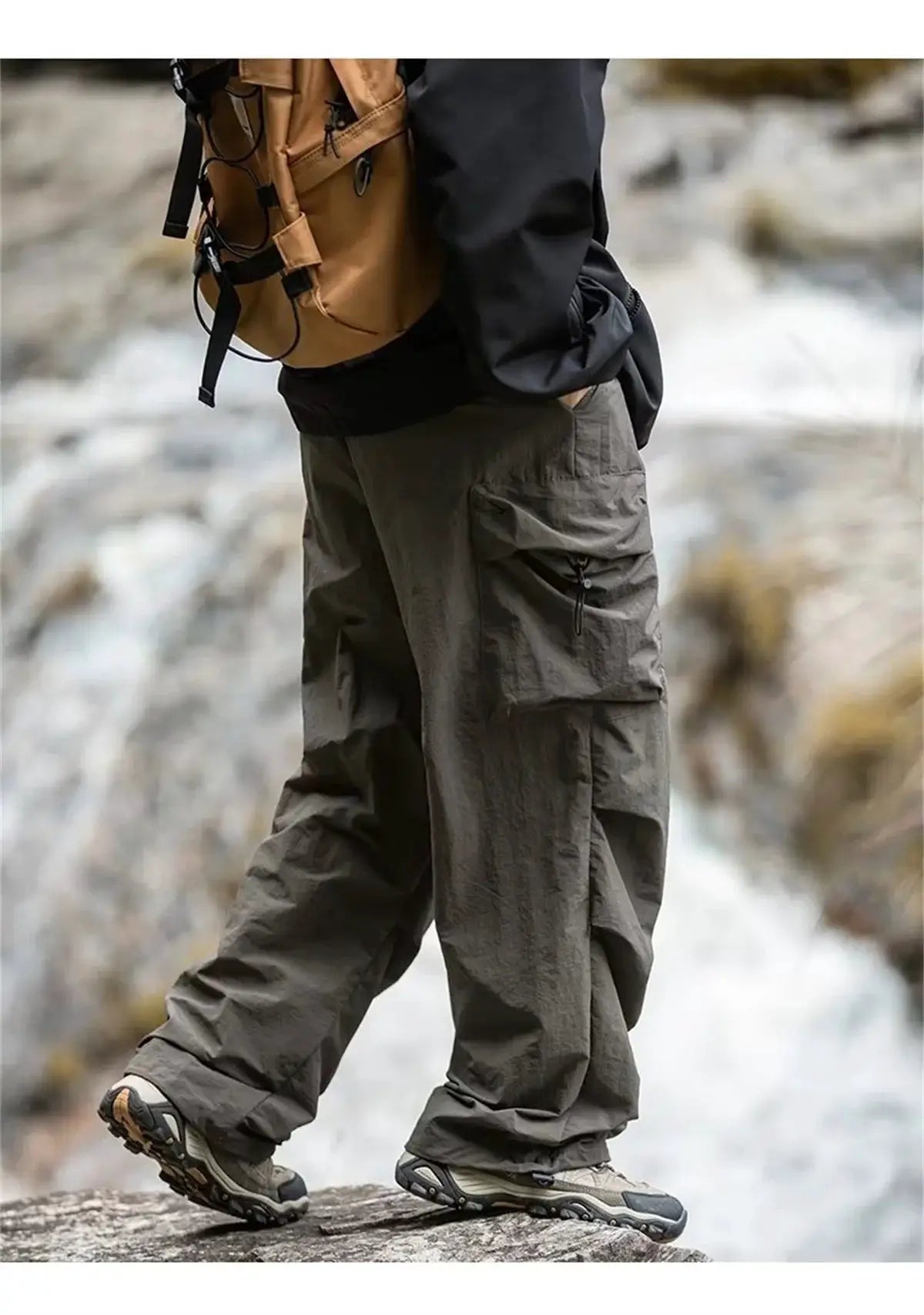 Men's cargo hiking pants in olive green with multiple pockets, waterproof for outdoor mountaineering