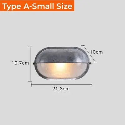 Outdoor retro LED wall lamp with glass cover and gray metal frame; 21.3 cm wide, 10.7 cm tall.