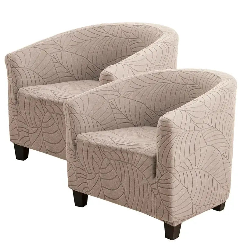 Two beige elastic leaf-pattern jacquard club chair slipcovers by Simples Market