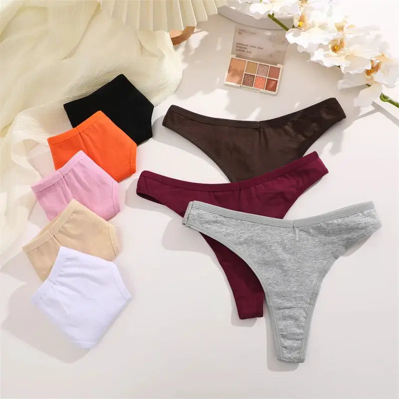 Women cotton seamless low-rise thongs, 4-piece set in solid colors for breathable everyday wear by Simples Market