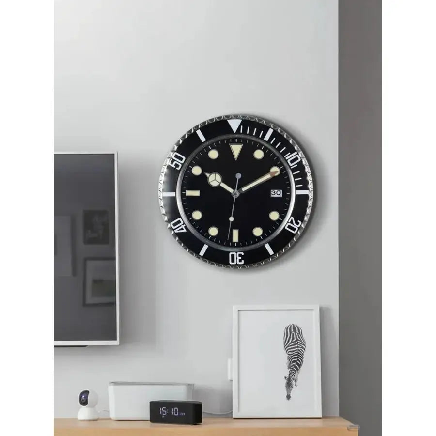Wall clock 34cm by Simples Market, black dial, luminescent markers, silver bezel, analog with date window