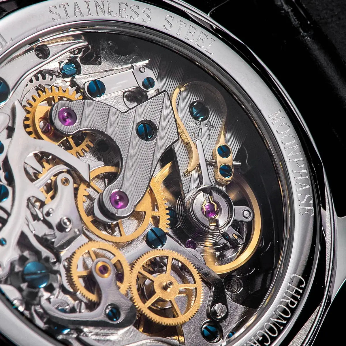 Sugess men's mechanical watch movement, stainless steel case back with gold gears, blue screws, and swanneck regulator