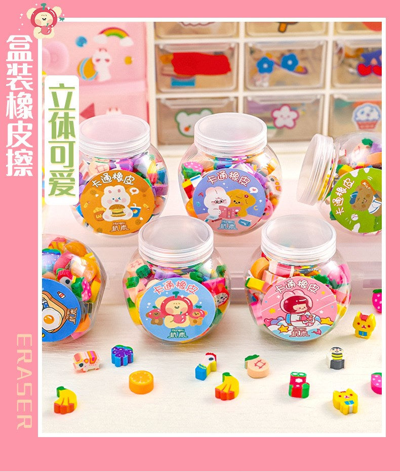 Pencil erasers in clear jars with kawaii animal and fruit shapes, colorful kids' stationery on pink background
