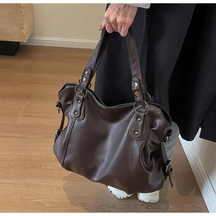 Soft interior compartment shoulder bag in dark brown PU leather with dual top handles