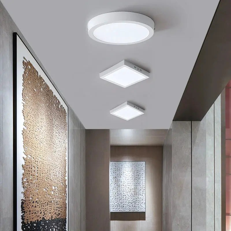 LED ceiling lamp set with 1 round flush-mount light and 3 square panel lights in white finish.