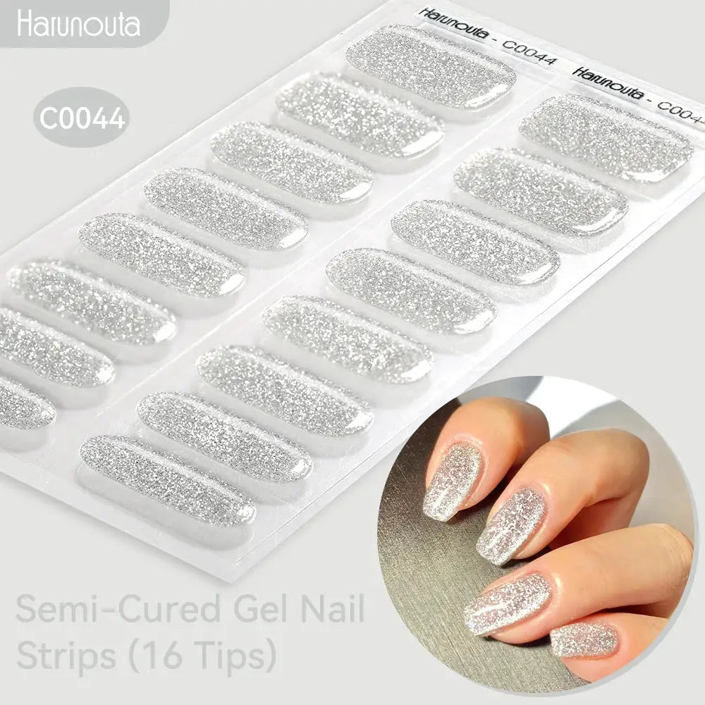 Semi-cured gel nail strips, Haunouta C0044 silver glitter gradient, 16 tips for DIY nails; works with UV/LED lamps.