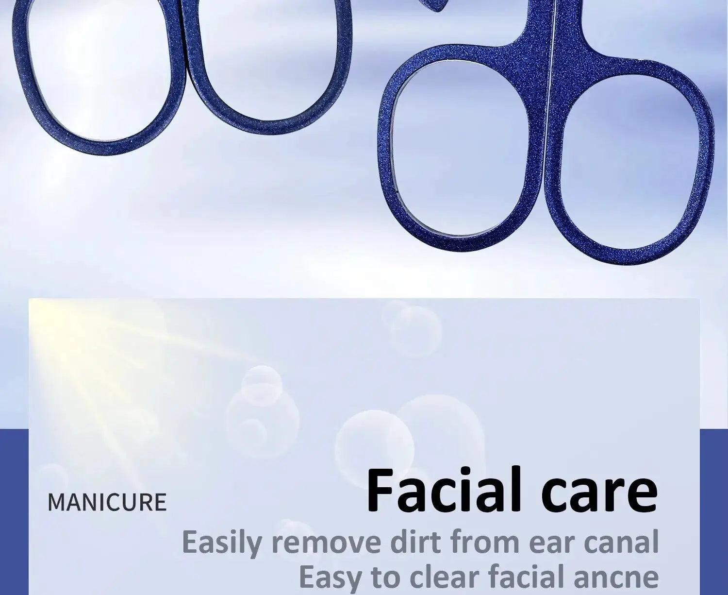 Nail care set with stainless steel clippers and manicure tools featuring blue glitter handles.