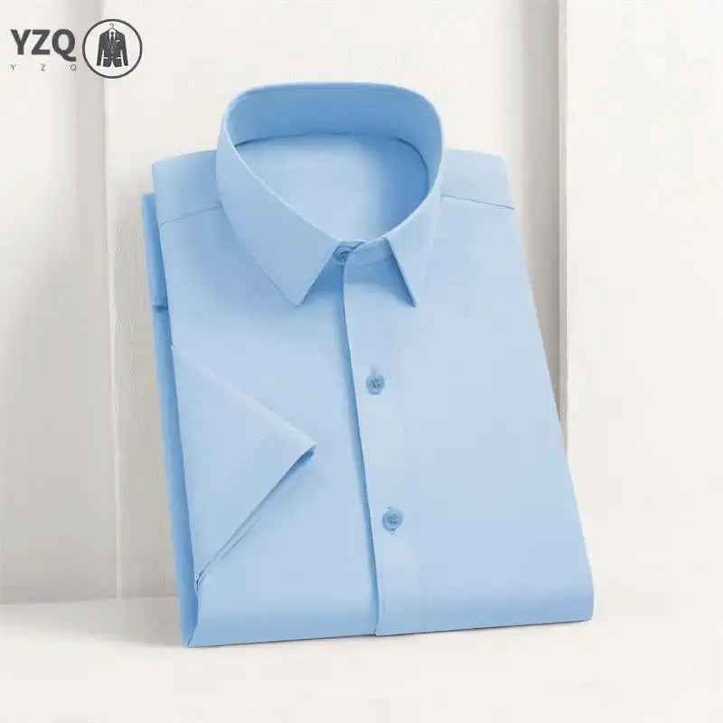 Light blue men's business casual dress shirt, solid color, no-iron, folded neatly.