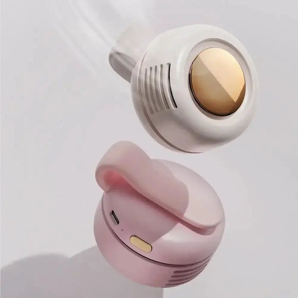 Portable clip-on bladeless fan, pink Simples Market wearable with 3 speed settings.