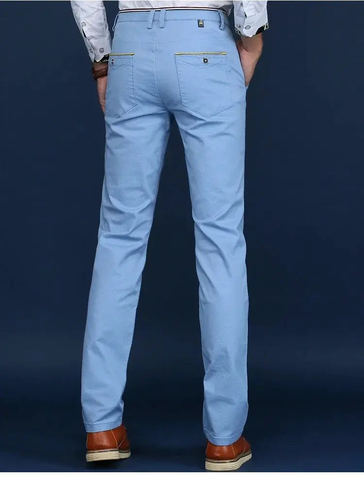 Men's light-blue cotton casual trousers by Simples Market with back pockets and yellow zipper trim